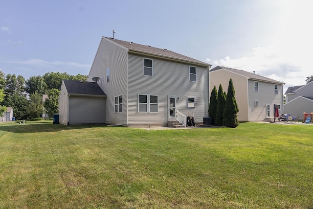 6107 Equestrian Woods Ct, Kalamazoo, MI 49009 - back of property featuring entry steps, a lawn, and a patio