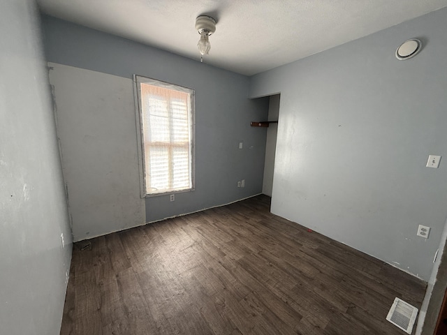 223 Washington Ave, Lakeview, MI 48850 - spare room featuring dark wood finished floors