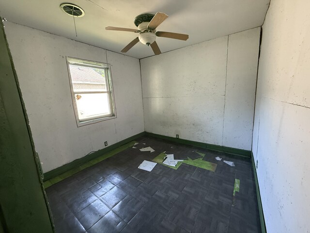 223 Washington Ave, Lakeview, MI 48850 - empty room featuring baseboards and a ceiling fan