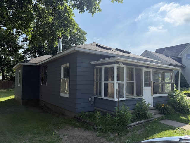 223 Washington Ave, Lakeview, MI 48850 - view of property exterior featuring a sunroom