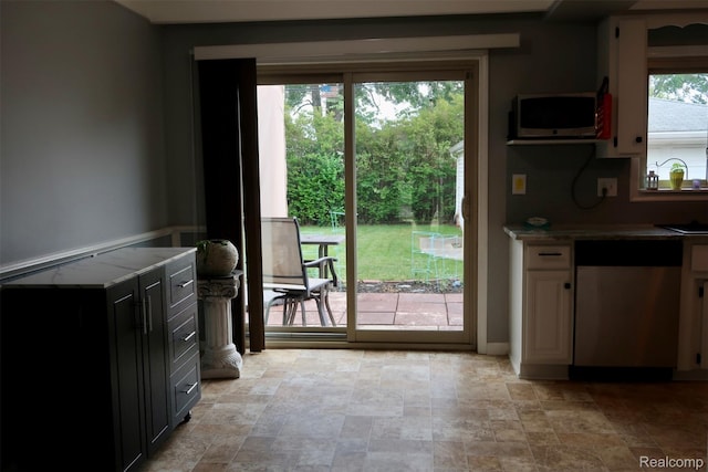28242 Aline Dr, Warren, MI 48093 - kitchen with appliances with stainless steel finishes, stone finish flooring, and light countertops