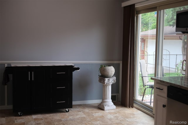 28242 Aline Dr, Warren, MI 48093 - bathroom featuring plenty of natural light and stone finish flooring
