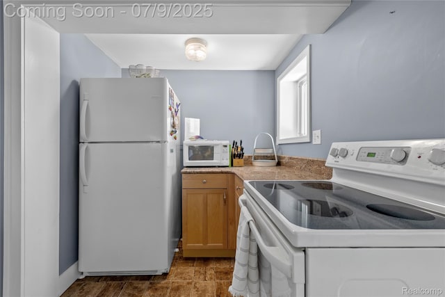 108 Highland Ave, Lake Orion, MI 48362 - kitchen featuring white appliances and brown cabinets