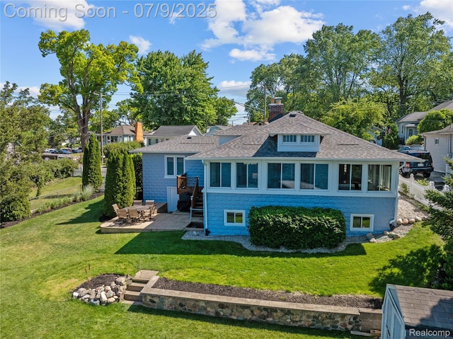 108 Highland Ave, Lake Orion, MI 48362 - rear view of property featuring a shingled roof, a patio, and a chimney