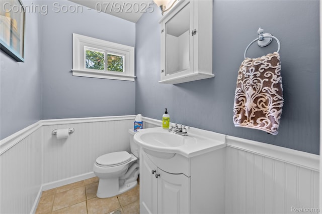 108 Highland Ave, Lake Orion, MI 48362 - half bath with wainscoting, vanity, and tile patterned floors