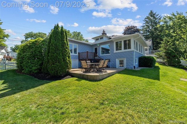 108 Highland Ave, Lake Orion, MI 48362 - back of house featuring a chimney and a patio area