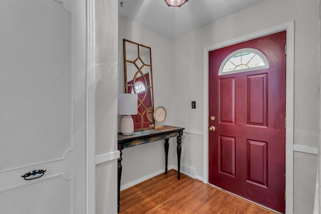 5951 Riverside Dr, Jackson, MI 49201 - foyer entrance featuring light wood-style flooring and baseboards