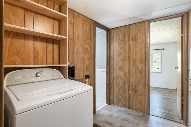 10295 S Osborn Ave, Fremont, MI 49412 - washroom with washer / dryer, wood finished floors, and wood walls