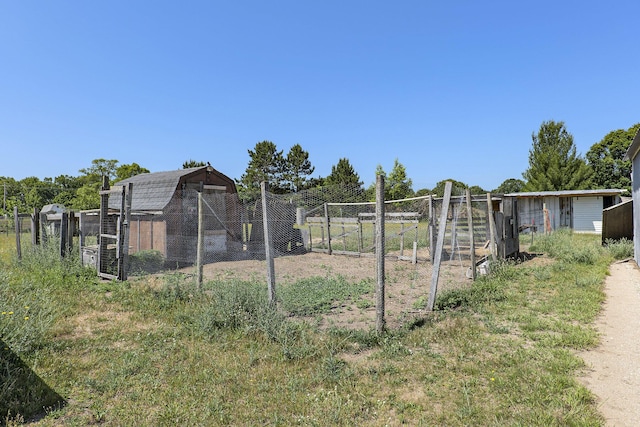 10295 S Osborn Ave, Fremont, MI 49412 - view of yard featuring exterior structure and an outbuilding