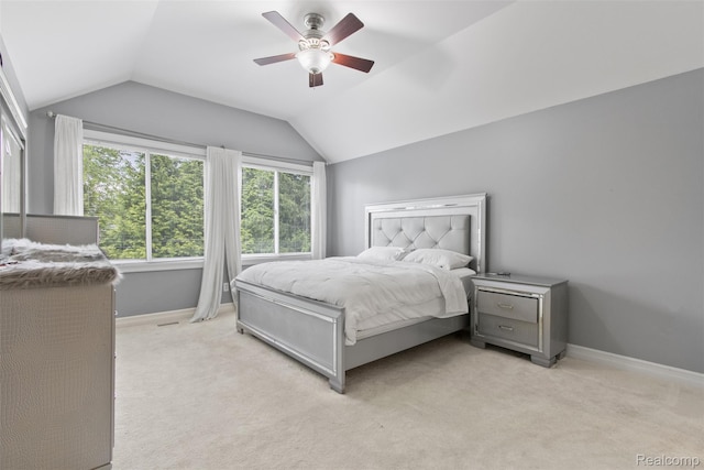 7759 W Branch Ct, Ypsilanti, MI 48197 - bedroom featuring vaulted ceiling, multiple windows, light colored carpet, and ceiling fan