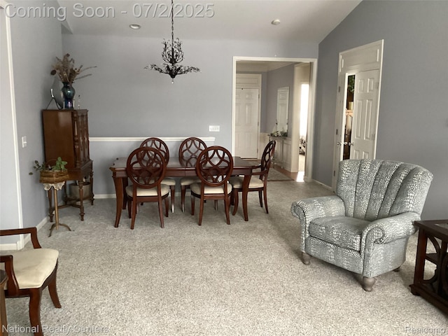 636 Zion Ct S, Howell, MI 48843 - carpeted dining space with lofted ceiling and recessed lighting