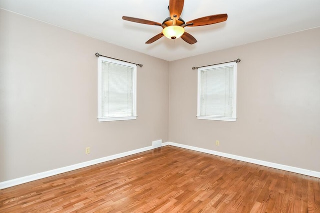 1624 Fulton St, Kalamazoo, MI 49001 - empty room featuring a ceiling fan and light wood finished floors