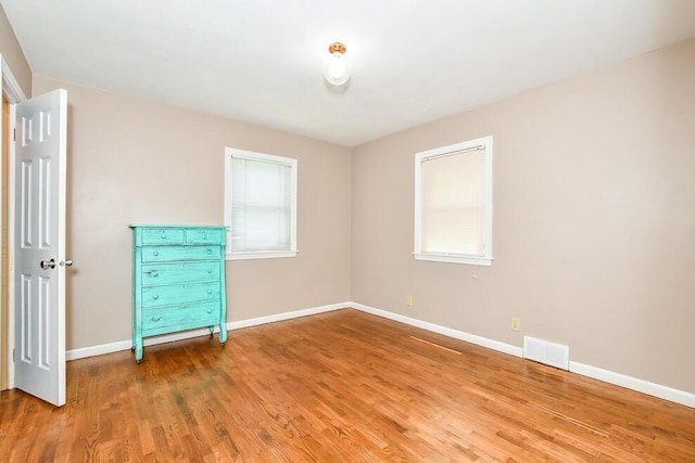 1624 Fulton St, Kalamazoo, MI 49001 - empty room with light wood finished floors