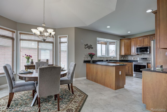 63705 Monticello E, Washington, MI 48095 - dining area featuring a chandelier and recessed lighting