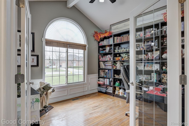 63705 Monticello E, Washington, MI 48095 - office space with ceiling fan, healthy amount of natural light, wainscoting, hardwood / wood-style floors, and a decorative wall