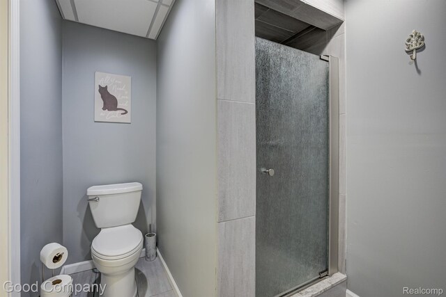 63705 Monticello E, Washington, MI 48095 - bathroom featuring a stall shower and toilet
