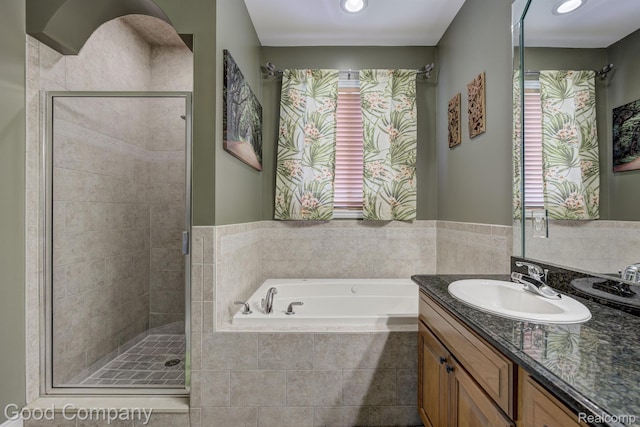 63705 Monticello E, Washington, MI 48095 - full bathroom featuring a bath, vanity, a stall shower, and recessed lighting