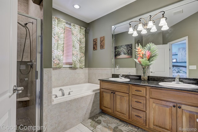 63705 Monticello E, Washington, MI 48095 - bathroom with double vanity, a garden tub, a stall shower, and tile patterned floors
