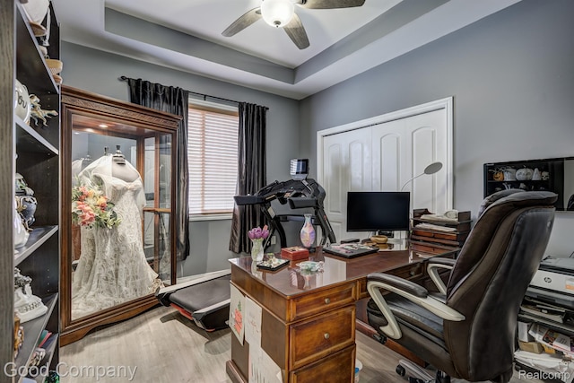 63705 Monticello E, Washington, MI 48095 - office space featuring a ceiling fan, wood finished floors, and a raised ceiling
