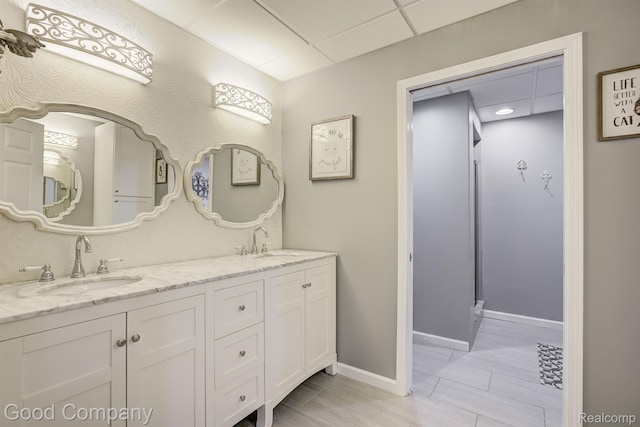 63705 Monticello E, Washington, MI 48095 - bathroom with double vanity and a drop ceiling