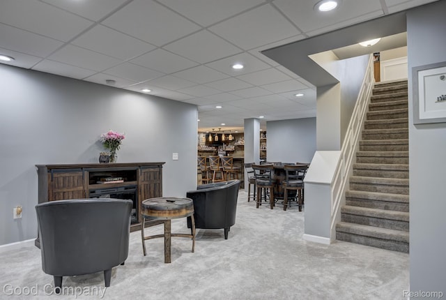63705 Monticello E, Washington, MI 48095 - carpeted living area with a community bar, stairs, and recessed lighting