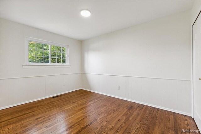 28230 Sutherland Dr, Warren, MI 48088 - empty room with wood finished floors and baseboards