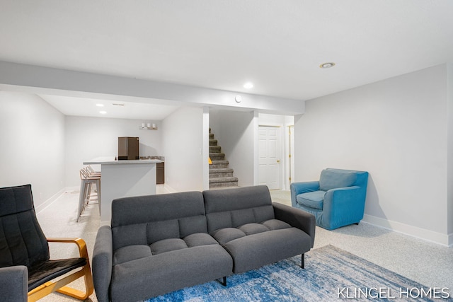 340 S Lake Ave, Spring Lake, MI 49456 - living room with recessed lighting, bar, stairway, and light colored carpet