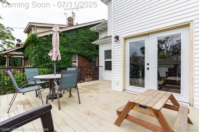 1424 Lakepointe St, Detroit, MI 48230 - wooden deck featuring outdoor dining area and french doors
