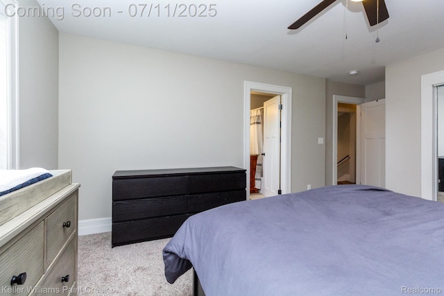 1424 Lakepointe St, Detroit, MI 48230 - bedroom with light carpet, a ceiling fan, and connected bathroom