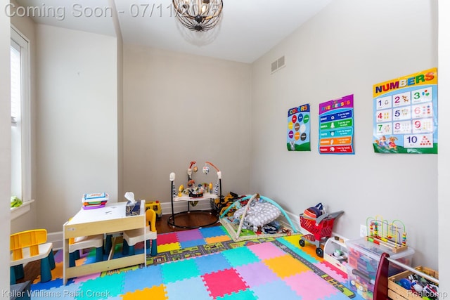 1424 Lakepointe St, Detroit, MI 48230 - playroom featuring a chandelier
