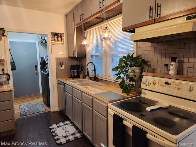 3705 Sancroft Ave, West Bloomfield, MI 48324 - kitchen with white range with electric cooktop, under cabinet range hood, gray cabinets, and dark wood-style floors