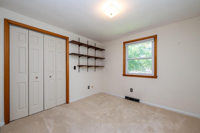 3813 Green Acre Dr, Saint Joseph, MI 49085 - unfurnished bedroom with light carpet and a closet
