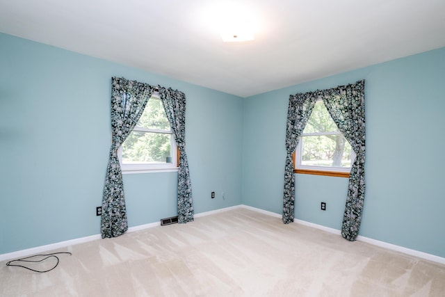 3813 Green Acre Dr, Saint Joseph, MI 49085 - unfurnished room with light colored carpet and baseboards