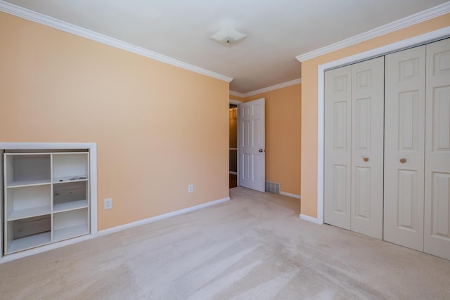 3813 Green Acre Dr, Saint Joseph, MI 49085 - unfurnished bedroom with carpet floors, ornamental molding, and a closet