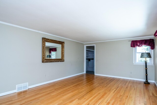 3813 Green Acre Dr, Saint Joseph, MI 49085 - unfurnished room with wood finished floors and ornamental molding