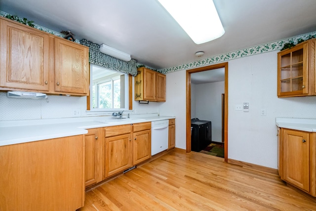 3813 Green Acre Dr, Saint Joseph, MI 49085 - kitchen with dishwasher, light wood-style floors, light countertops, and brown cabinets