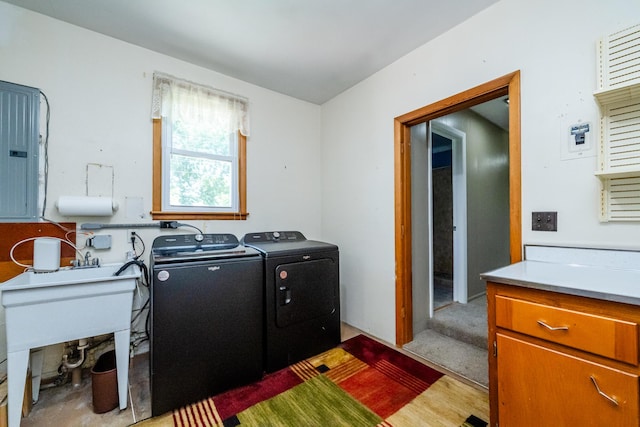 3813 Green Acre Dr, Saint Joseph, MI 49085 - laundry area featuring washing machine and clothes dryer, light wood-style flooring, and electric panel