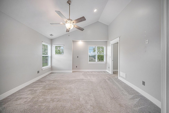 2807 Bartlett Rd, Pleasant Lake, MI 49272 - empty room with a ceiling fan, plenty of natural light, light colored carpet, and high vaulted ceiling