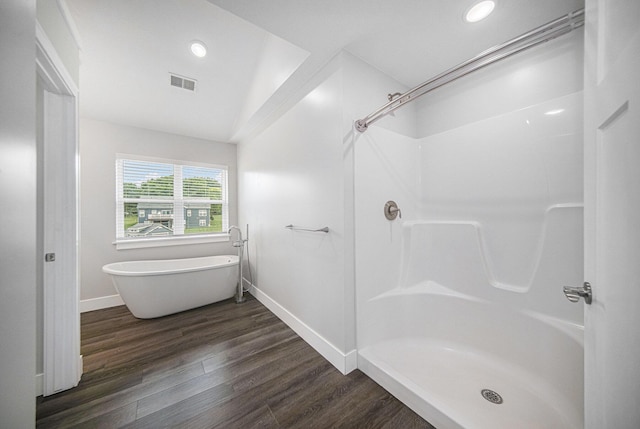 2807 Bartlett Rd, Pleasant Lake, MI 49272 - full bath with a freestanding tub, wood finished floors, a shower, and recessed lighting
