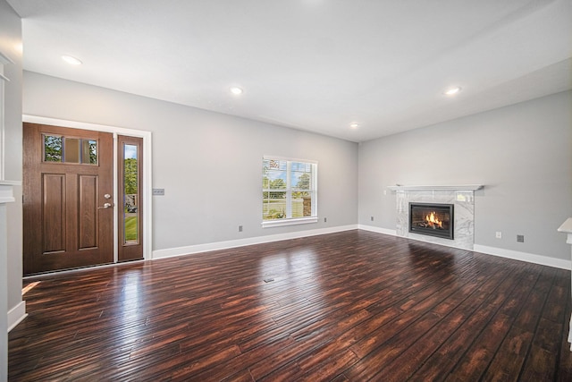 2807 Bartlett Rd, Pleasant Lake, MI 49272 - unfurnished living room with hardwood / wood-style floors, a premium fireplace, and recessed lighting