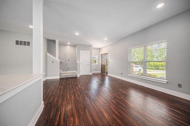 2807 Bartlett Rd, Pleasant Lake, MI 49272 - unfurnished living room with dark wood finished floors and recessed lighting