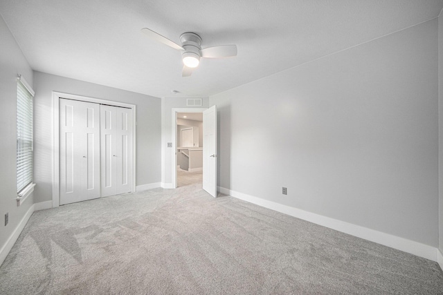 2807 Bartlett Rd, Pleasant Lake, MI 49272 - unfurnished bedroom featuring carpet flooring, a closet, and ceiling fan
