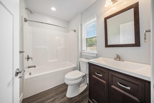2807 Bartlett Rd, Pleasant Lake, MI 49272 - bathroom with wood finished floors, vanity, and  shower combination