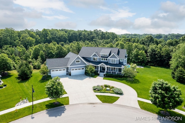 12974 Boulderway Trl, Grand Haven, MI 49417 - view of subject property with a heavily wooded area