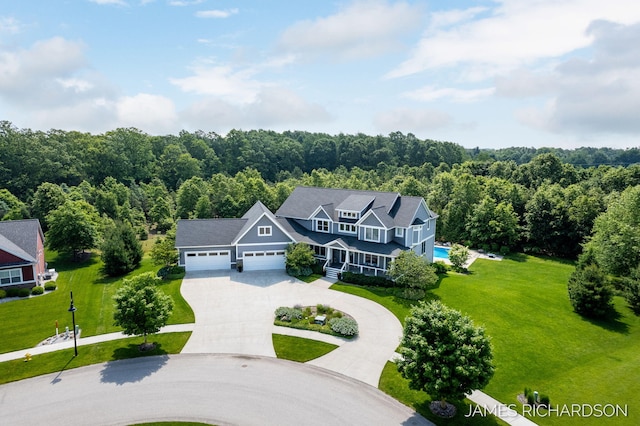 12974 Boulderway Trl, Grand Haven, MI 49417 - view of subject property with a heavily wooded area