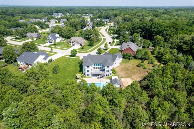 12974 Boulderway Trl, Grand Haven, MI 49417 - drone / aerial view of a heavily wooded area