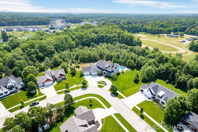 12974 Boulderway Trl, Grand Haven, MI 49417 - aerial perspective of suburban area featuring a forest