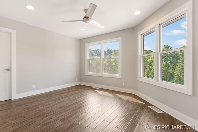 12974 Boulderway Trl, Grand Haven, MI 49417 - unfurnished room with dark wood-style floors, recessed lighting, and ceiling fan