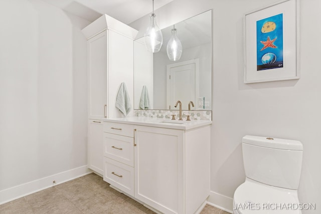 12974 Boulderway Trl, Grand Haven, MI 49417 - bathroom featuring vanity and baseboards