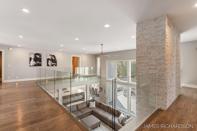 12974 Boulderway Trl, Grand Haven, MI 49417 - stairway with wood-type flooring, recessed lighting, and a ceiling fan